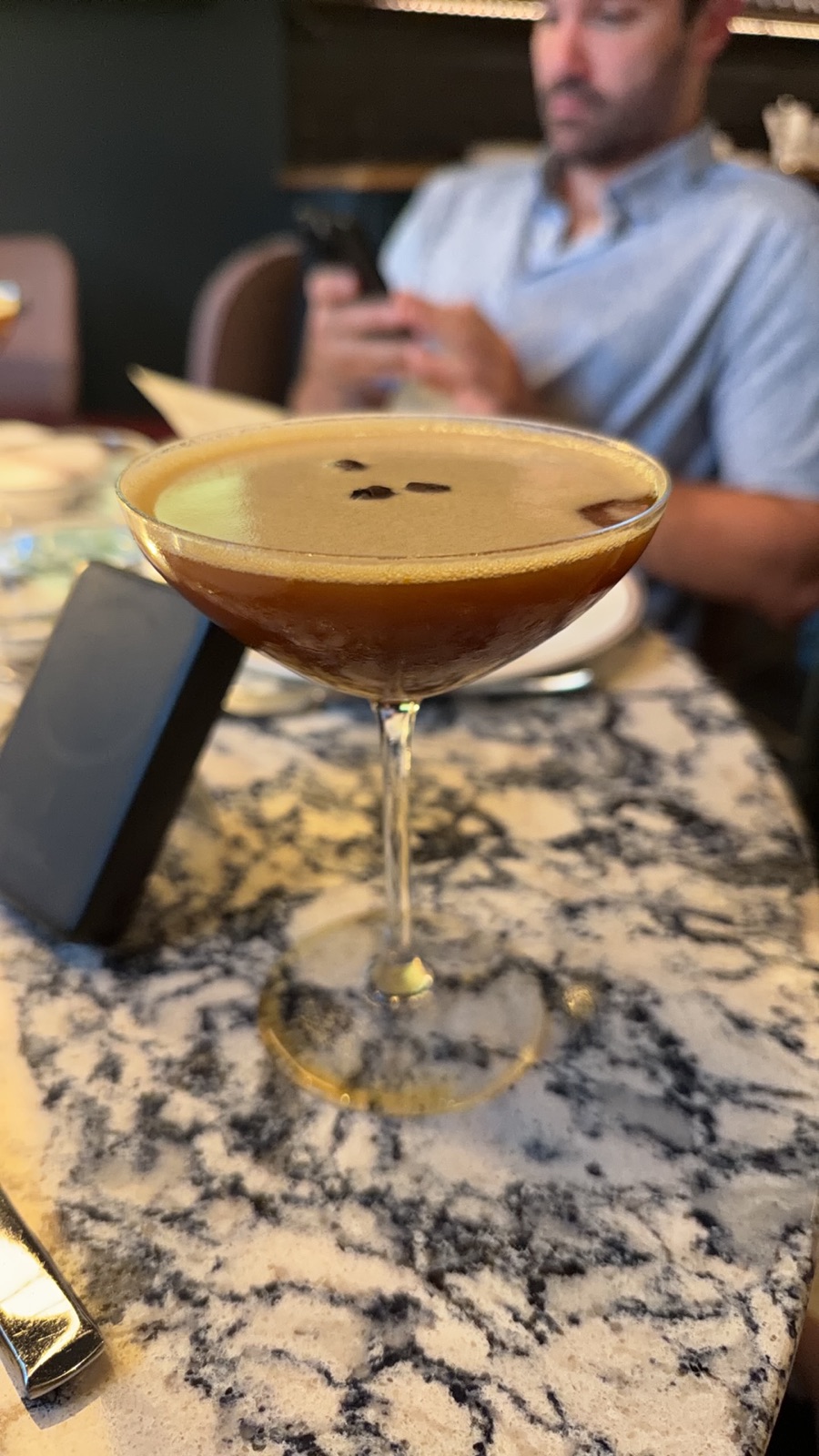 Espresso martini at Ajax Downtown, photographed by Adam Glospie